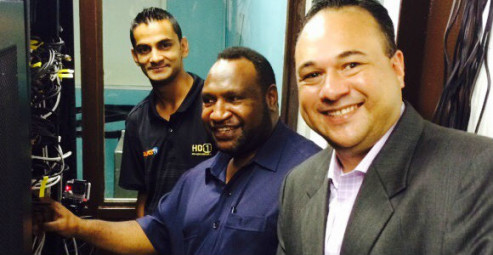 Click's Engineering Manager; Reenal Deo; PNG's Minister for Finance James Marape and MD Richard Broadbridge.