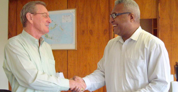 CDB's Bruce Mackinlay (left) with Michael Kaiser of founding member, Teachers Savings & Loan. Credit: CDB