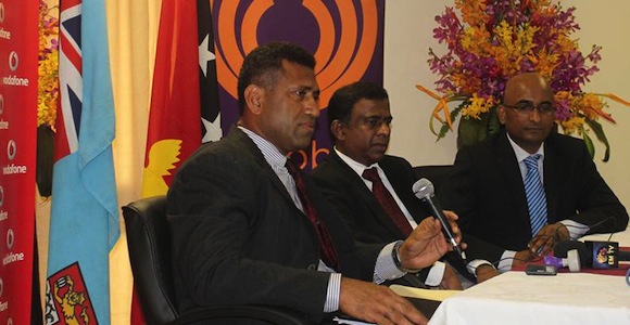 Fiji National Provident Fund CEO Aisake Taito, left, talks to the media after the signing of the Bemobile contract. With him are the FNPF Chairman Ajith Kodagoda and Vodafone Fiji Limited’s CEO Pradeep Lal. Credit: FNPF