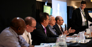 Business Advantage International's Andrew Wilkins discusses equity investment with (from left), University of PNG's Albert Mellam, Nasfund's Andrew McGrath, Kina Securities' Syd Yates, POMSoX's Frank Dunphy and Nambawan Super's Michael Block.