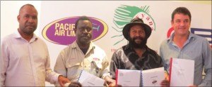 Gas deal signed. Chairman Rex Aipe, Iman Papa,  John Imaka and  Tony Carmichael. Credit; Post-Courier