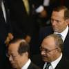 Peter O'Neill with Australia's PM Tony Abbott and former Japanese PM, Yasuo Fukuda at the swearing in ceremony of Indonesia's Joko Widodo.