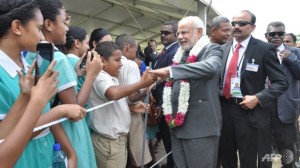 India's Naraendra Modi mobbed by Fiji schoolchildren. Credit: ChannelNewsAsia