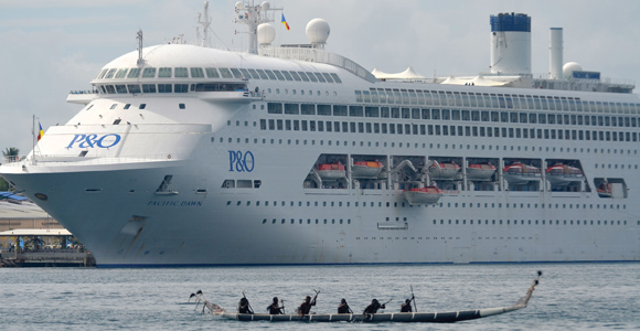 A P&O cruise liner arrives in Milne Bay. Credit: David Conn