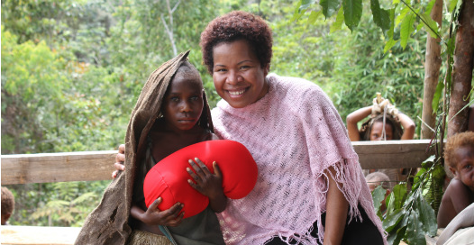 Digicel PNG Foundation CEO Beatrice Mahuru with Aiopi. Credit: Digicel PNG Foundation.