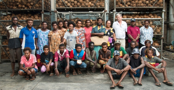Directors Debra and Dennis Hill with the Niugini Organics team. Credit: Jody Cleaver.