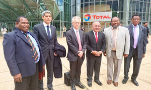 (Left to Right) Governor for Gulf Province, Hon. Havila Kavo MP, TOTAL E&P PNG Managing Director, Philippe Blanchard, TOTAL Senior Vice-President for the Asia-Pacific, Olivier de Langavant, Prime Minister, Hon. Peter O’Neill CMG MP, Minister for Minister Petroleum and Energy, Hon. Ben Micah MP, and Papua New Guinea Ambassador to France, H.E. Joshua Kalinoe CSM CBE, at the Global Headquarters building for TOTAL SA Credit: Prime Minister's Office