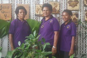 Tinah Kama with staff at Bill’s Tropical Eden. Credit: The National