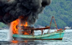  PACIFIC PAPUA NEW GUINEA 18 Jan 2017 Sinking illegal 'blue boats' not enough of a deterrent - advisor 2:43 pm on 18 January 2017 Share this Share on Twitter Share on Facebook Share via email Share on Google Plus Share on Reddit Share on Linked In Blowing up, burning and sinking so-called Vietnamese "blue boats" for illegally fishing in some Pacific countries and Indonesia is not enough of a deterrent, a Pacific fisheries adviser says. This picture shows a Vietnamese fishing boat in flames after Indonesian Navy officers blew up the vessel due to illegal fishing activities in the remote Anambas Islands.A Vietnamese fishing boat in flames after the Indonesian military blew it up for fishing illegally. Credit: AFP