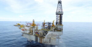 The Pasca A offshore oil rig sits out in the bay.