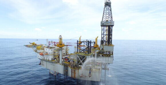 The Pasca A offshore oil rig sits out in the bay.